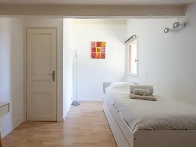 Un ou plusieurs lits dans un hébergement de l'établissement Villa élégante à Capbreton pour 12 personnes avec jardin - FR-1-791-27