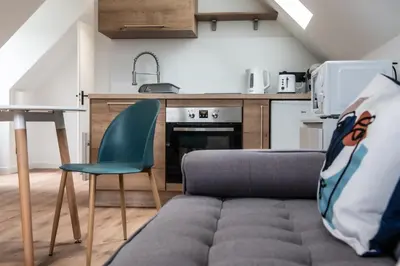 Cuisine ou kitchenette dans l'établissement Appartement moderne avec parking