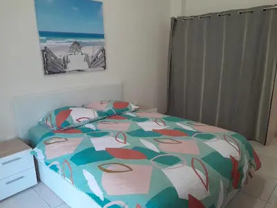 Un ou plusieurs lits dans un hébergement de l'établissement Appartement 4 pers à Mimizan Plage, tout confort entre océan et forêt, terrasse ensoleillée - FR-1-50-148