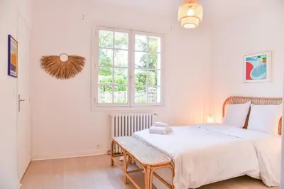 Un ou plusieurs lits dans un hébergement de l'établissement Maison du golf proche centre, lac et plages