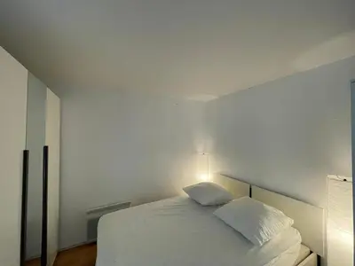 Un ou plusieurs lits dans un hébergement de l'établissement Duplex T2 avec Piscine à Capbreton proche Plage - FR-1-413-250