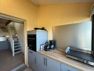 Cuisine ou kitchenette dans l'établissement Duplex T2 avec Piscine à Capbreton proche Plage - FR-1-413-250