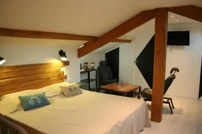 Un ou plusieurs lits dans un hébergement de l'établissement Chambres d'hotes Les sables Blancs