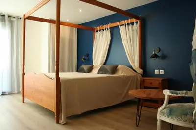 Un ou plusieurs lits dans un hébergement de l'établissement Chambres d'hotes Les sables Blancs