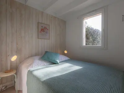 Un ou plusieurs lits dans un hébergement de l'établissement Holiday Home Paradise Océan-16 by Interhome
