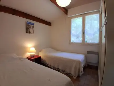 Un ou plusieurs lits dans un hébergement de l'établissement Maison Plain-pied avec Jardin, Proche Plage et Pistes Cyclables, 6 Pers, Wifi, Parking - FR-1-239-436