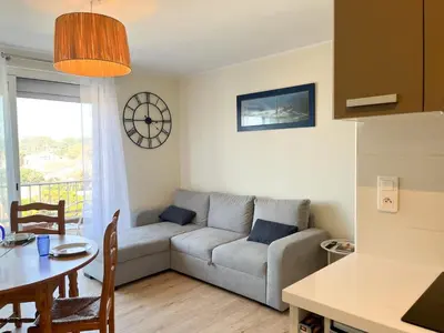 Coin salon dans l'établissement Appartement familial proche des plages