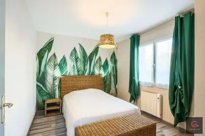 Un ou plusieurs lits dans un hébergement de l'établissement Biscarrosse Bourg, jolie petite maison pour 4 personnes avec Terrasse et jardin
