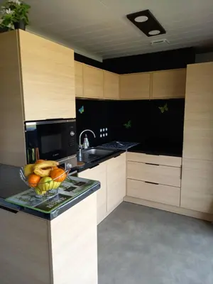 Cuisine ou kitchenette dans l'établissement Charmant Cottage