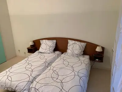 Un ou plusieurs lits dans un hébergement de l'établissement Très jolie studio à louer avec sa belle terrasse de 4m2 idéalement situé dans un hôtel thermale