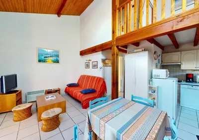 Cuisine ou kitchenette dans l'établissement LES ESTIVALES - Maison mitoyenne pour 4 personnes