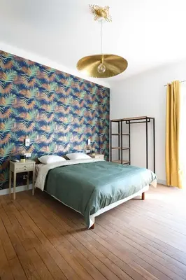 Un ou plusieurs lits dans un hébergement de l'établissement Villa Pomade