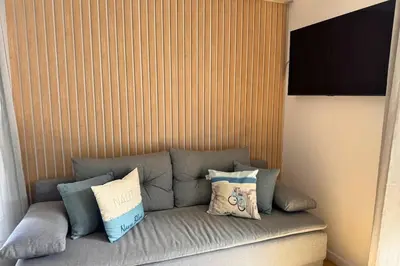Télévision ou salle de divertissement dans l'établissement Le Cottage Détente