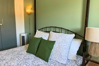 Un ou plusieurs lits dans un hébergement de l'établissement Le Cottage Détente