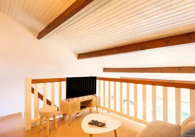 Télévision ou salle de divertissement dans l'établissement Maison des Embruns