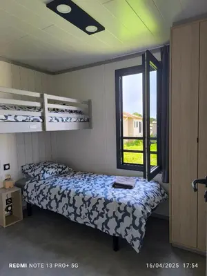 Un ou plusieurs lits dans un hébergement de l'établissement cottage Landes entre terre et ocean