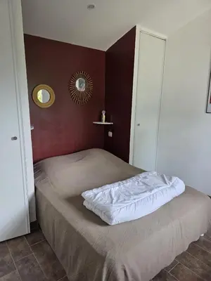 Un ou plusieurs lits dans un hébergement de l'établissement Villa Pignon