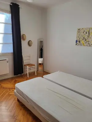 Un ou plusieurs lits dans un hébergement de l'établissement Appartement proche du lac d'Hossegor