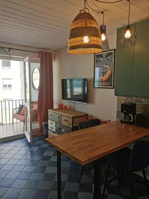 Télévision ou salle de divertissement dans l'établissement Capbreton plage centrale Vue Mer Appart Parking