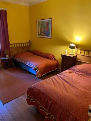 Un ou plusieurs lits dans un hébergement de l'établissement Domaine de Beauregard
