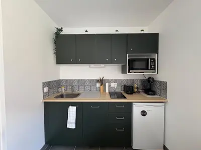 Cuisine ou kitchenette dans l'établissement Appartement Côté Dune à 600m de l'Océan