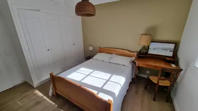 Un ou plusieurs lits dans un hébergement de l'établissement CAPBRETON. Villa ALAMEAT avec 3 chambres .Climatisation. Wifi gratuit.
