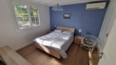 Un ou plusieurs lits dans un hébergement de l'établissement CAPBRETON. Villa ALAMEAT avec 3 chambres .Climatisation. Wifi gratuit.