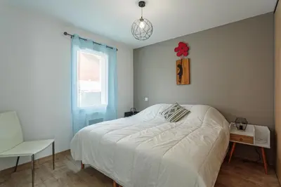Un ou plusieurs lits dans un hébergement de l'établissement Villa Kaino 2 - Climatisée avec piscine