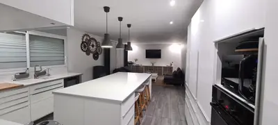 Cuisine ou kitchenette dans l'établissement Villa OyamaÏ