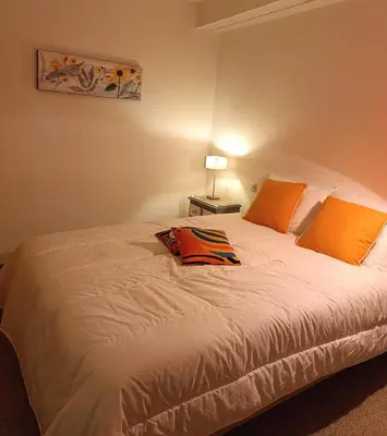 Un ou plusieurs lits dans un hébergement de l'établissement Bel appartement hyper centre