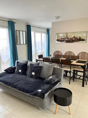 Coin salon dans l'établissement Charmante villa