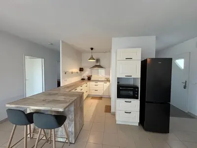 Cuisine ou kitchenette dans l'établissement Escapade Féline