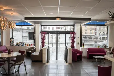 Coin salon dans l'établissement Hotel Bains Sarrailh