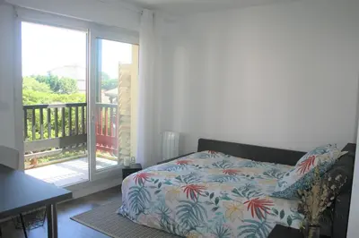 Un ou plusieurs lits dans un hébergement de l'établissement Ambiance Cosy Capbreton