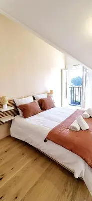 Un ou plusieurs lits dans un hébergement de l'établissement LE NID DU TEICH Duplex COSY ET CENTRAL A 5 MINUTES DE LA GARE