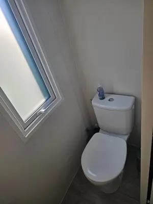 Salle de bains dans l'établissement Mobilehome cosy