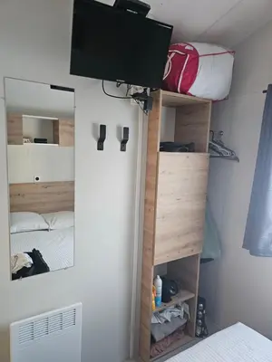Un ou plusieurs lits dans un hébergement de l'établissement Mobilehome cosy