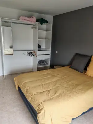 Un ou plusieurs lits dans un hébergement de l'établissement Maison de campagne sur puyoo