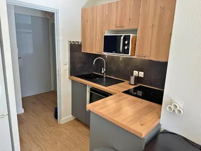 Cuisine ou kitchenette dans l'établissement L'Eclat Terrasse - Piscine - Tennis