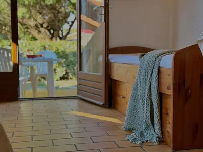 Un ou plusieurs lits dans un hébergement de l'établissement Colibri - Studio à 500m des plages