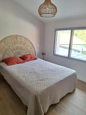 Un ou plusieurs lits dans un hébergement de l'établissement Maison 6 à 8 pers au bord du Lac de Biscarrosse