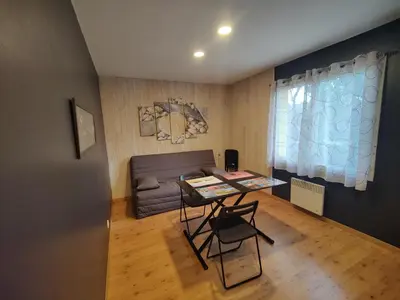 Télévision ou salle de divertissement dans l'établissement La Suite Soleil