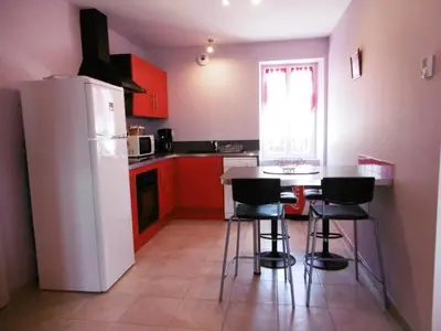 Cuisine ou kitchenette dans l'établissement La dugue sud