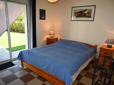 Un ou plusieurs lits dans un hébergement de l'établissement Maison 4 chambres avec piscine, à 8 min du lac de Sanguinet - FR-1-521-249