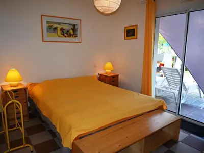 Un ou plusieurs lits dans un hébergement de l'établissement Maison 4 chambres avec piscine, à 8 min du lac de Sanguinet - FR-1-521-249