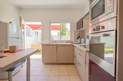 Cuisine ou kitchenette dans l'établissement Maison Caupos