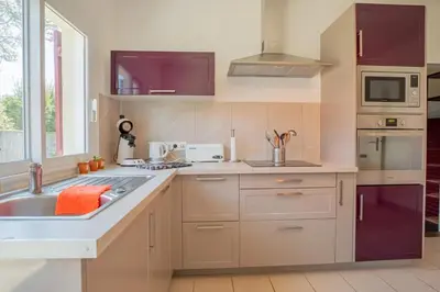 Cuisine ou kitchenette dans l'établissement Maison Caupos