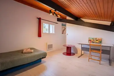 Coin salon dans l'établissement Maison Caupos