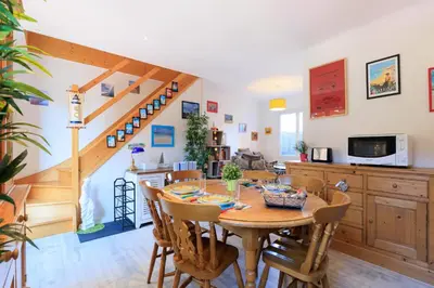 Coin salon dans l'établissement Maison des Bonheurs Océaniques - Welkeys