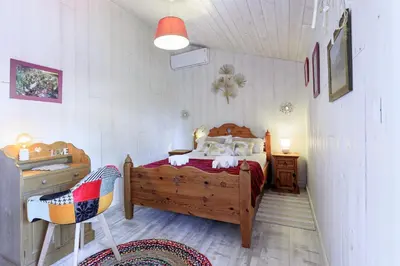 Un ou plusieurs lits dans un hébergement de l'établissement Maison des Bonheurs Océaniques - Welkeys